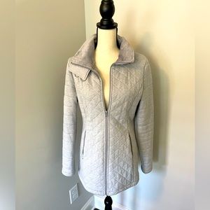 Northface grey long jacket. Size M. Never worn. Comfy!